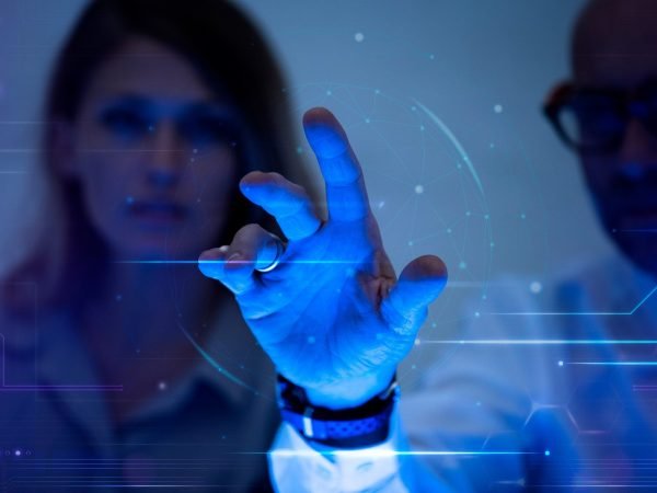 Man touching a virtual screen futuristic technology digital remix